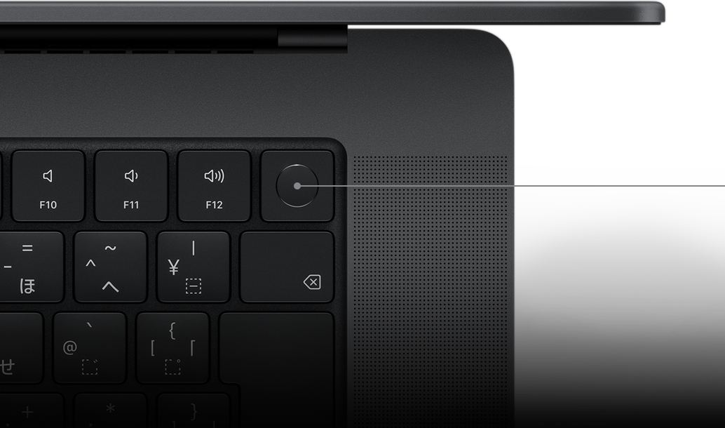 Pointer showing the Touch ID key on the Magic Keyboard.